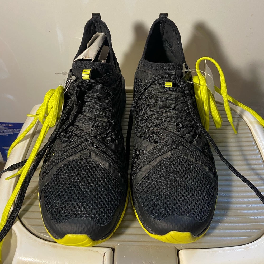 Puma black and neon yellow sneakers size 7